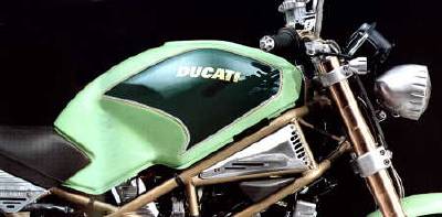 Detail of the Special Ducati Monster 900 with De Pretto Moto designed and manufactured accessories and sports-detailed replacement parts.