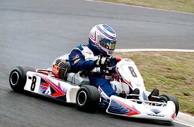 Drew Price Engineering's AX8 kart on the track.