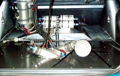 A view of the rear-end part of the SBR fuel system - tank, filler manifold and pump array. The fuel filler manifold allows for a variety of alternative fuelling scenarios, each dictated by the particular track the car is racing on.