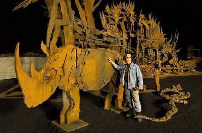 Albert Paley with a rhino that Scan2CAD converted from scanned outline to AutoCAD DXF.  (Photo credit: St Louis Zoo.)