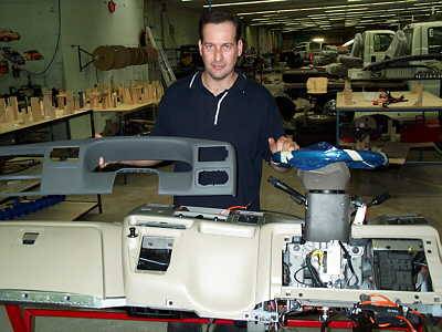 Deluca shows the new right-hand drive instrument panel partially assembled.  Virtually all of the new assembly has been redesigned and manufactured.