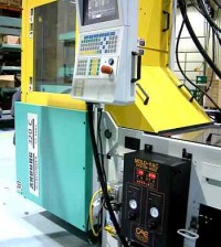 Mold-VAC air and gas evacuation systems attached to injection molding machine